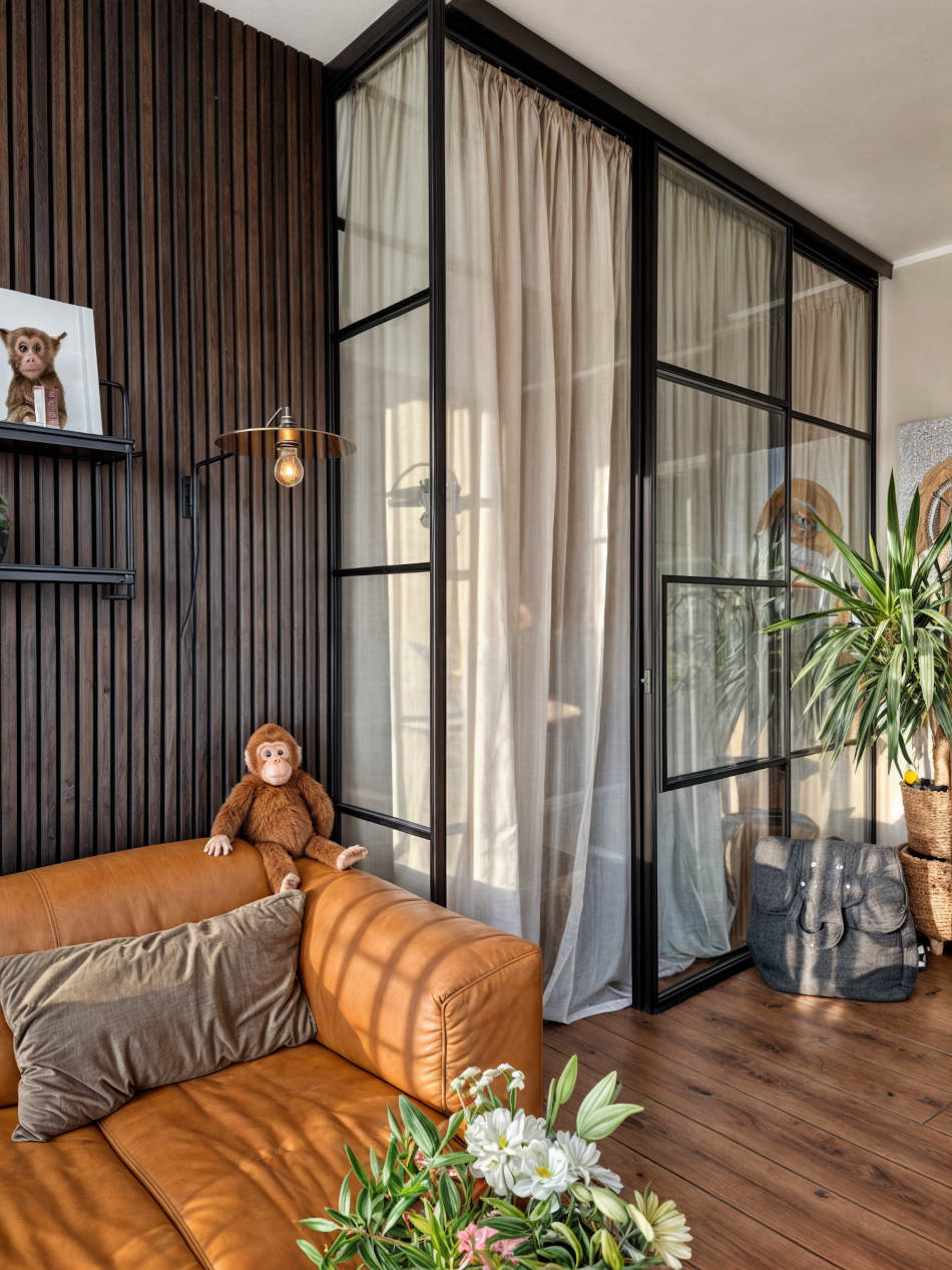 Loft-Schiebetür aus Stahl und Glas im Wohnzimmer
